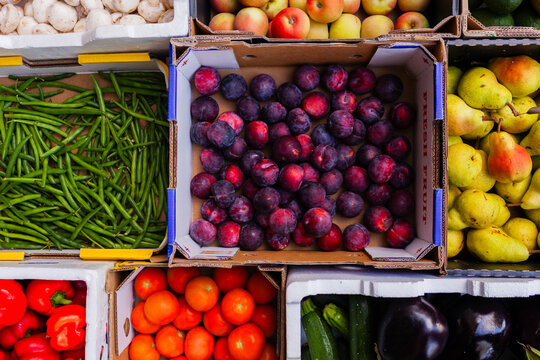 Colourful fresh organic fruit and veg straight from farmers in boxes delivered to hub