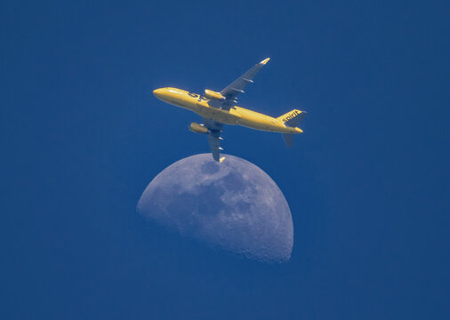 Spirit Airlines Jet Passes the Moon Shortly After Takeoff