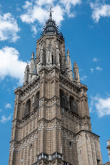 Fototapeta premium Bell tower of the Cathedral of Saint Mary, also known as the Primate Cathedral of Spain, is a Gothic Catholic church in Toledo, Castile-La Mancha, Spain.