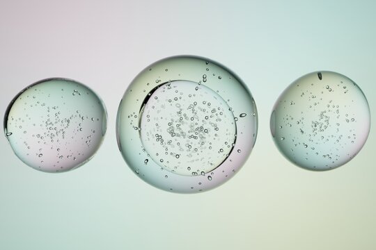 Transparent bubbles with small particles inside, 3D render