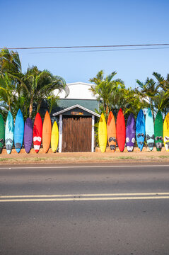 Fence made of old surfboards, as seen from the public road. Maui, Hawaii
