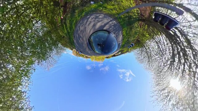 Ultra Wide Footage of British Urban City Streets During Car Drive. The Footage Was Captured with Car Roof Mounted 360 Camera During Sunny Day