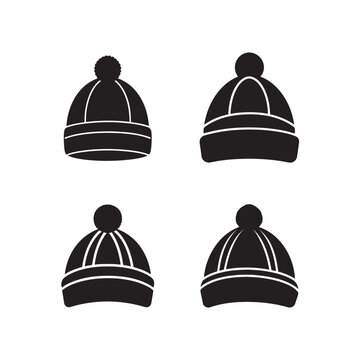 Black hats with white stripes and pom poms on top for winter clothing and fashion accessories