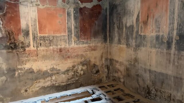 Ancient Carbonized Wooden Bed Frame Preserved in a Herculaneum Villa