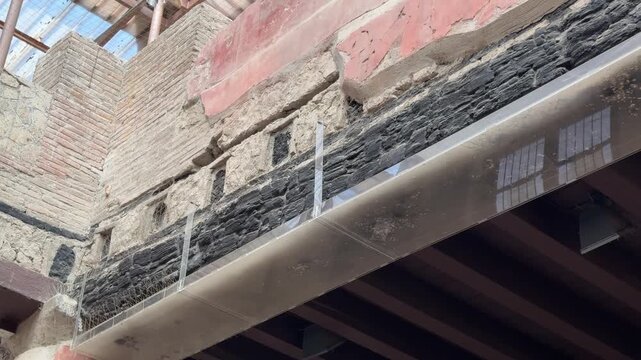 Ancient Carbonized Wooden Beam Preserved in a Herculaneum Villa