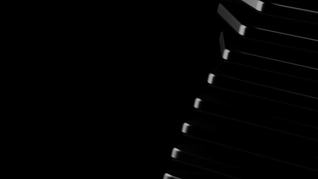 Dark geometric blocks arranged in a curved vertical stack positioned on the right side of a black frame for copy space with professional studio lighting