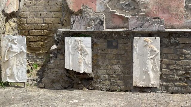 Granite Plaques Depicting Gods in the Sacred Area of Herculaneum