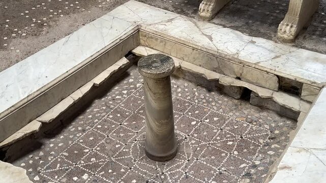 Ancient Roman Impluvium with Central Stone Pillar in a Herculaneum Villa
