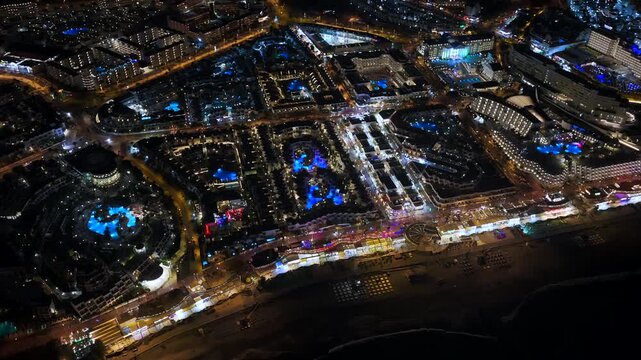 Costa Adeje Nightlife and Luxury Resorts at Night; Tenerife South Real Estate Sprawl and Housing Crisis 