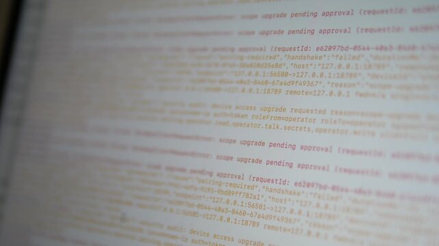 Cinematic out-of-focus background of digital technical logs and computer code on a monitor, abstract cyber security and software development concept with copy space