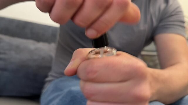 Hand opening bottle with corkscrew tool