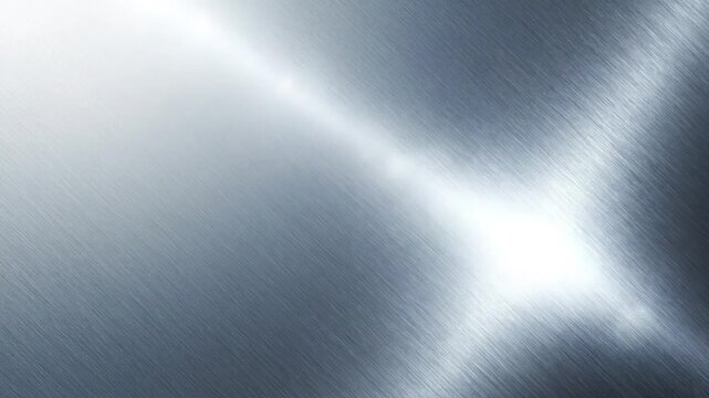 Shining metallic surface reflects light in a modern industrial setting with sleek gray tones and smooth textures.