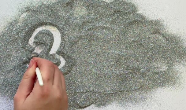 White numbers "2027" engraved on silver glitter. A sleek, minimalist design, perfect for modern projects. Perfect for year-based themes, New Year's, and winter holidays.