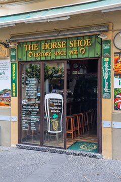 Sorrento, Italy - 6. March 2026: The Horse Shoe Irish pub entrance in Sorrento