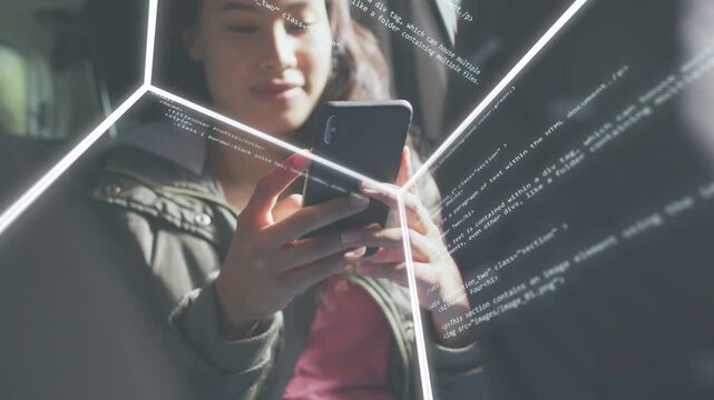 Woman tapping phone in vehicle, starting wireframe cube and scrolling code overlay, showing AR tech
