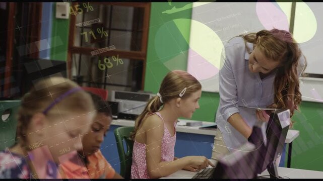 Teacher leaning, pointing at screen, girl in pink looking up, education charts overlaying screen
