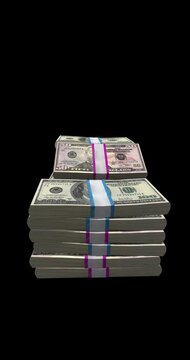 Stacks of us dollar bills 100s and 50s on black background