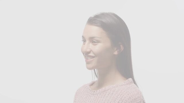Woman in pink knit posing dashes appearing causing smiling laughing settling neutral for ads