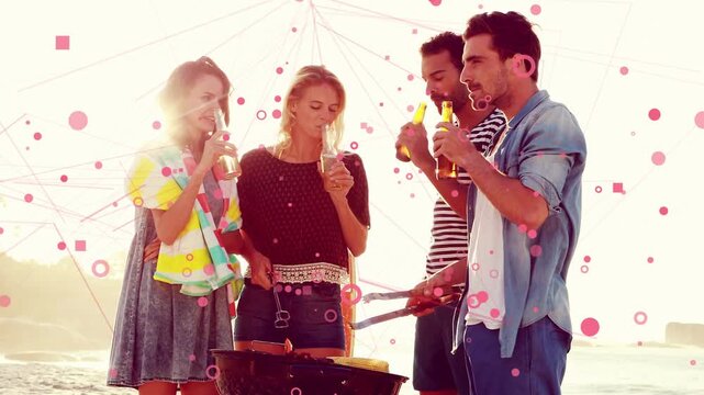Group toasting with beer toast sparking sipping and grilling on shore as pink dots floating leisure