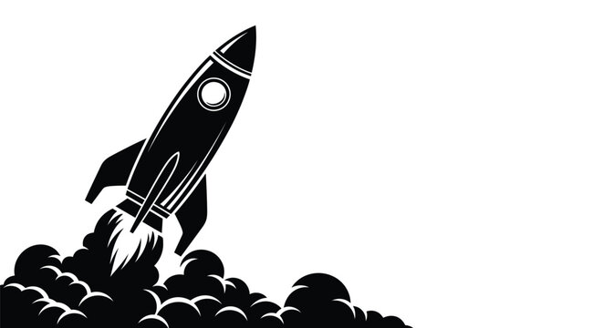 Rocket launching with fiery exhaust trail a striking black silhouette