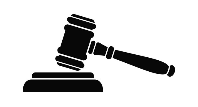 Black gavel resting on a sound block a legal symbol silhouette