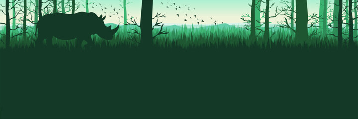 Flat design calm woodland banner with rhinoceros silhouette © FahrizalNurMuhammad
