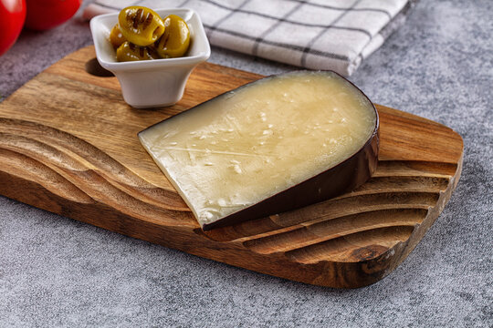 French Gruyere cheese over board