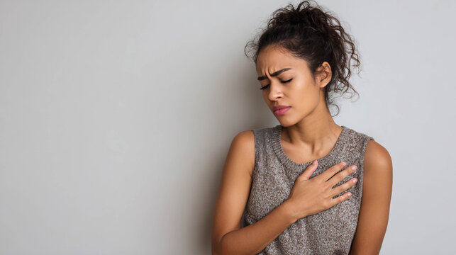 Young woman suffering from chronic chest pain and fatigue, fibromyalgia awareness concept