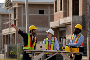 Fototapeta premium woman worker and engineer under inspection and checking production process on factory station. Factory Engineer. Professional Heavy Industry Engineer Worker. Team of factory workers.
