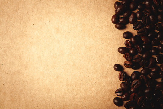 coffee beans on old paper background with filter effect retro vintage style