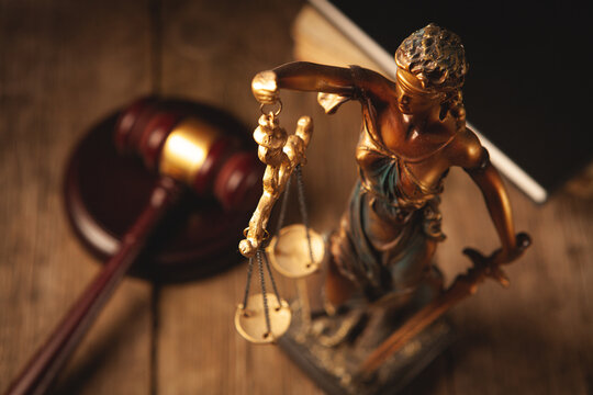 Law theme, mallet of judge, wooden gavel and scales of justice