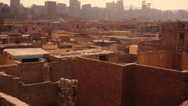 Cairo aerial view of the City of the Dead and garbage city. Smooth Steadicam shot from a slightly elevated perspective showing the contrast between Cairo&rsquo;s City of the Dead 