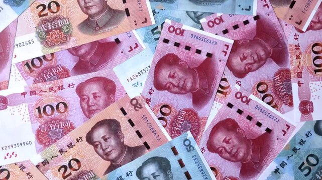 Chinese paper money, yuans in various denominations. China money as a business background for your design