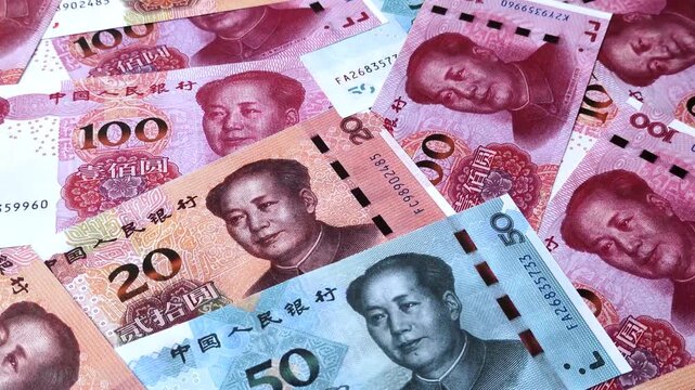 Chinese paper money, yuans in various denominations. China money as a business background for your design