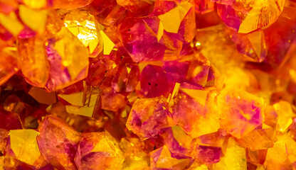 Multi-colored crystal mineral stone. Gems. Mineral crystals in the natural environment. Texture of precious and semiprecious stones. shiny surface of precious stone © Vera