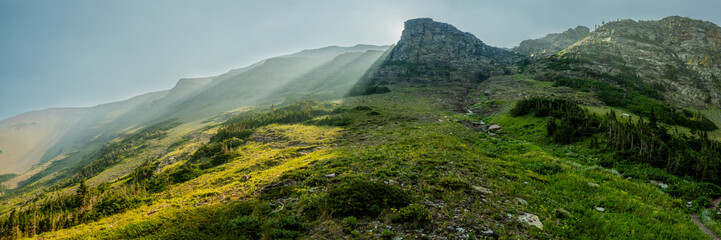 Naklejka premium Panorama Of Light Rays Breaking Over Red Gap Pass