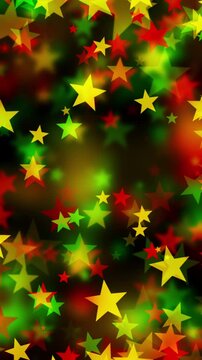 Stars floating outward in bold red, yellow, and green colors on black background for Juneteenth, or Freedom Day, to commemorate the ending of slavery on June 19th 1865 in the United States of America.