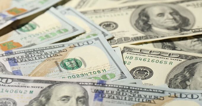Old and new hundred dollar bills as background, closeup