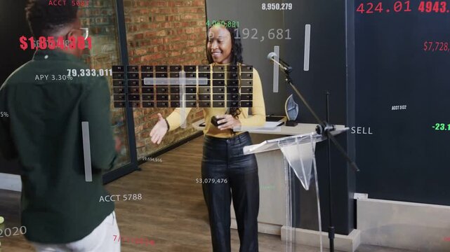 Audience clapping, man coming while woman speaking at lectern exchanging object near SELL sign