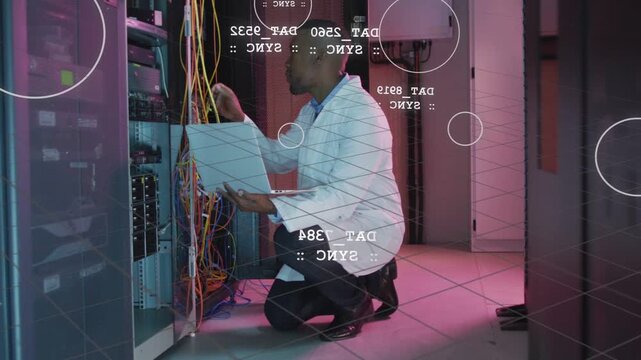 IT tech kneeling using laptop tracing patch cables on rack while HUD graphics guiding diagnostics