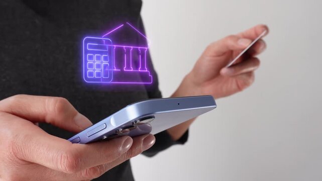 Financial analysis. Businesswoman holding a bank card while holding a smartphone with a virtual bank icon and calculator.
