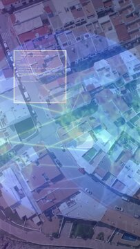 Vertical video: Aerial view starting, overlay moving, boxes marking roofs for coast data analysis