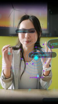 Vertical video: Female presenter pinching, using AR labels and circles while explaining ML concepts