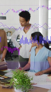 Vertical video: PM leaning while designer pointing plans, causing purple bars over table for design