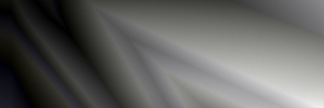 Smooth black and silver folds flow diagonally to create a sleek metallic abstract, ideal for tech branding, luxury presentations, and sophisticated modern layouts.