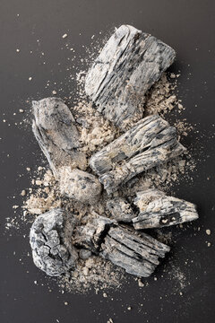 Close-up of the burned wood charcoal and ashes