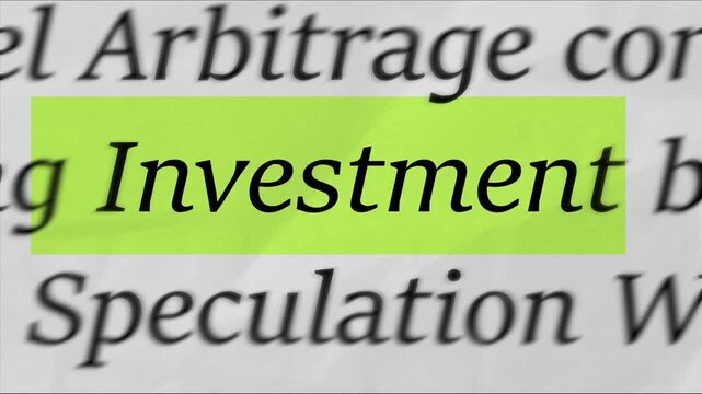 Highlighting the word Investment on printed document, macro focus text concept for finance, portfolio, stock market, wealth building and long term growth video

