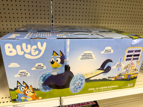 Bluey Ride On Scooter Toy Box Displayed On Retail Shelf