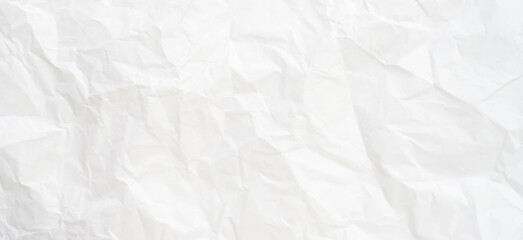 Fototapeta premium Top view and full frame of wrinkled or crumpled white paper texture used as crumpled white paper background texture in decorative art work
