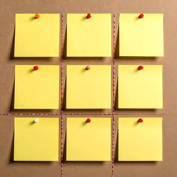 Eight yellow sticky notes on cardboard.